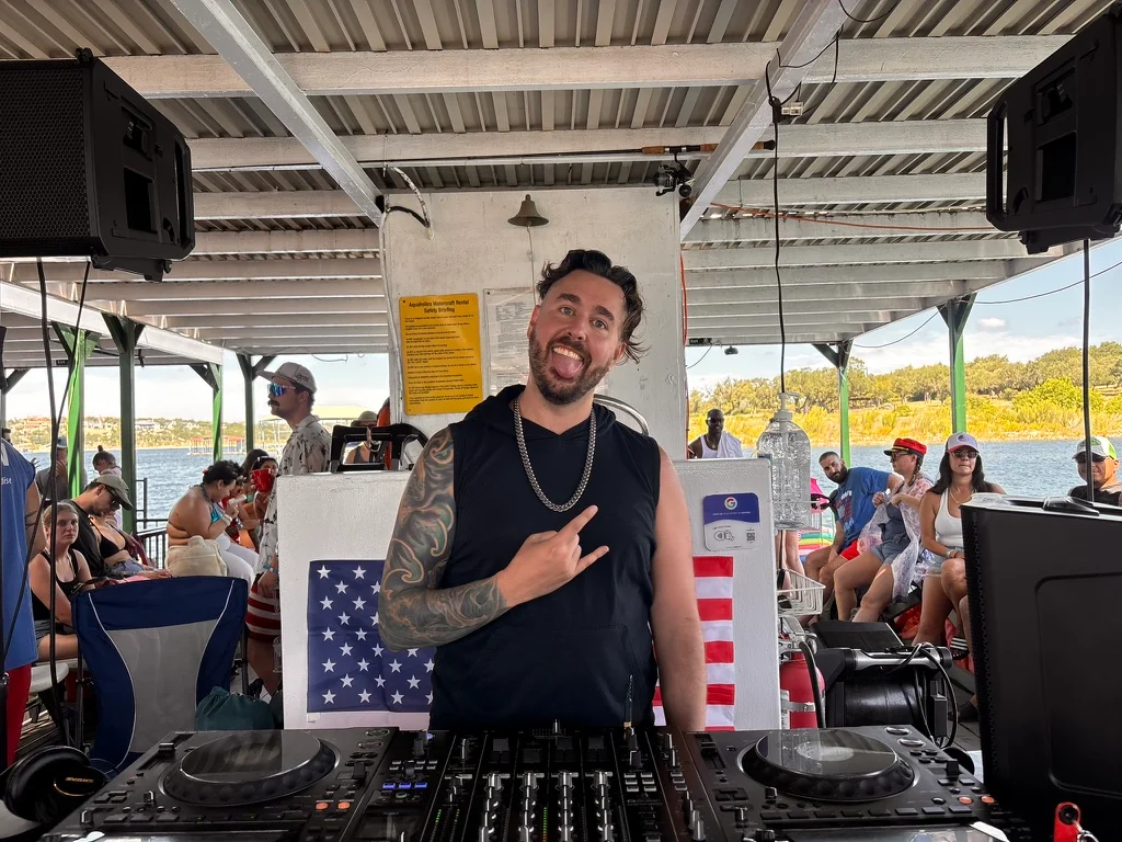 Artefex performing a DJ set on Town Lake in Austin